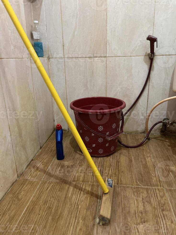 Cleaning bathrooms toilets and sinks using soap and brushes is a daily activity photo