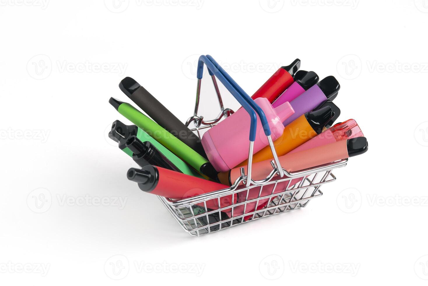 A set of colorful disposable electronic cigarettes of different shapes in a grocery basket on a white background with copy space. Concept of modern smoking. photo