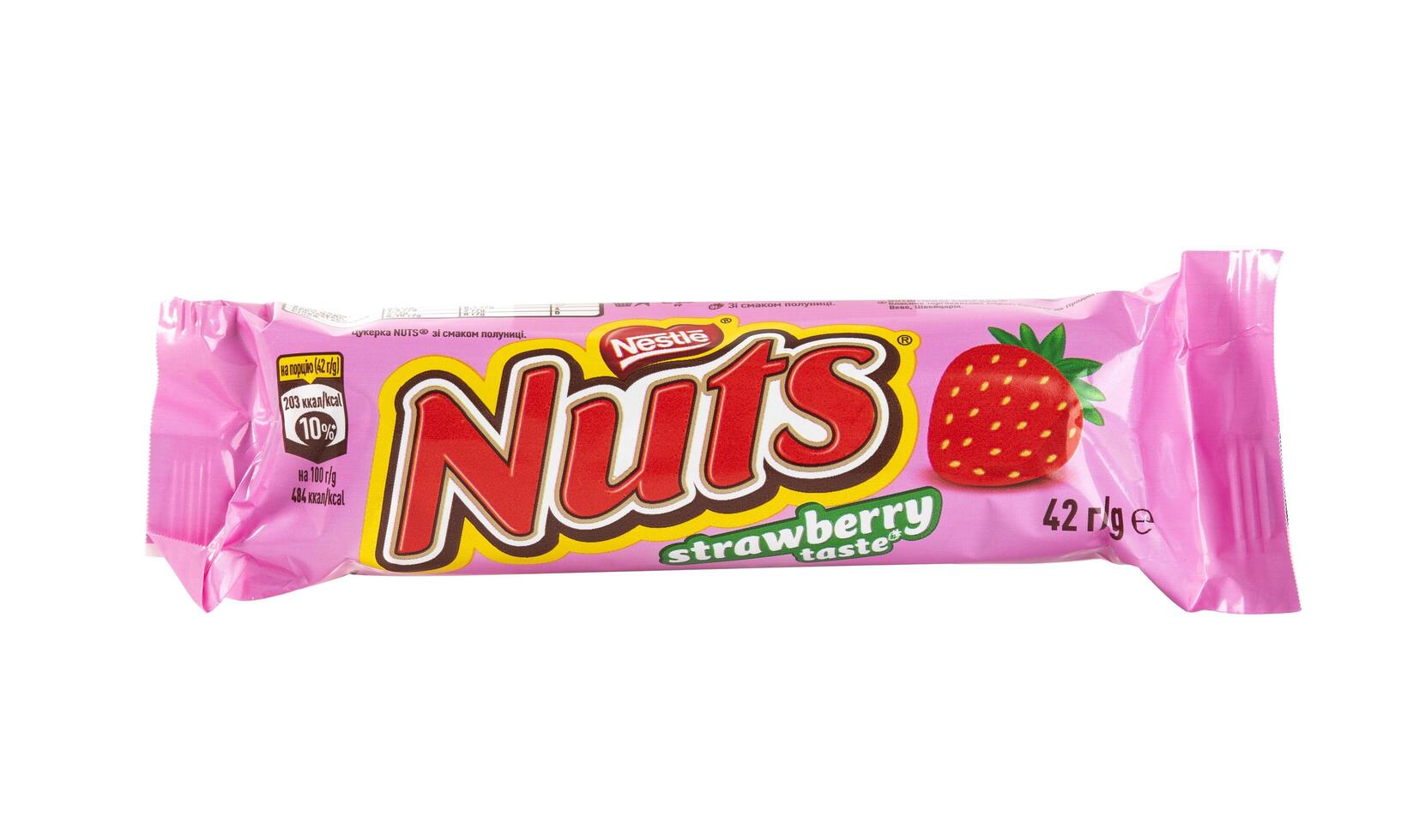 Kyiv - Ukraine. September, 2022 Closeup of Nuts Strawberry taste candy chocolate bar made by Nestle isolated on white with clipping path photo