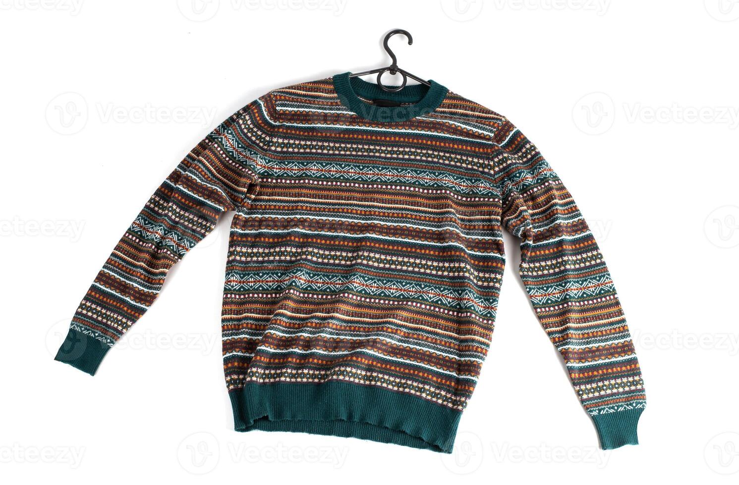 colored sweater with green, orange and brown colors. long sleeve patterned jumper isolated on white background photo