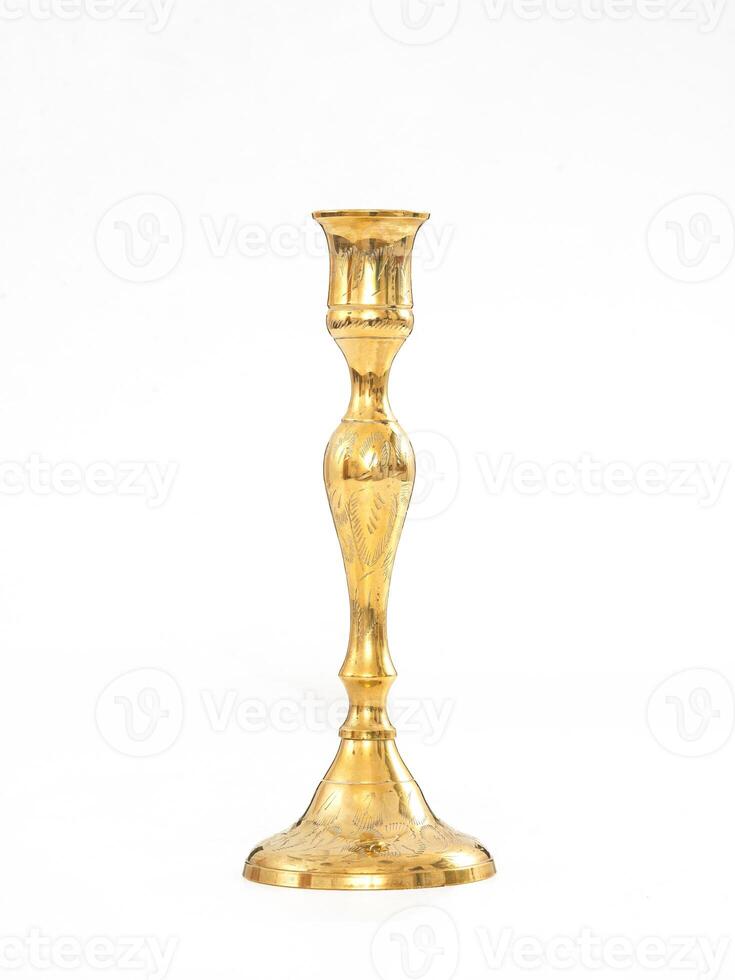 Antique Bronze Candlestick on Isolated White Background. photo