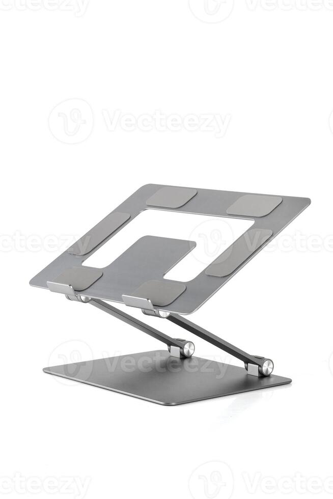 Aluminum laptop stand, to improve ventilation on a white background in isolation photo