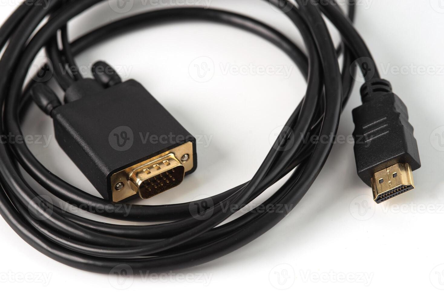 HDMI to VGA and audio adapter on white background. Allows users to connect devices with various types of displays such as computers to projectors or other types of displays. photo