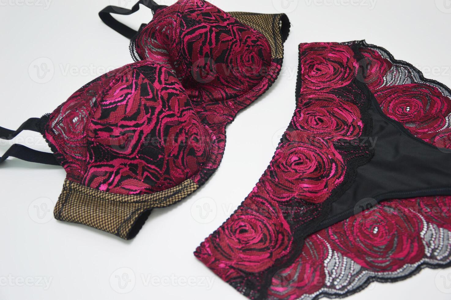 Lingerie. Lace set - Pink with black bra and panties on a white background. Fashionable women's underwear. photo