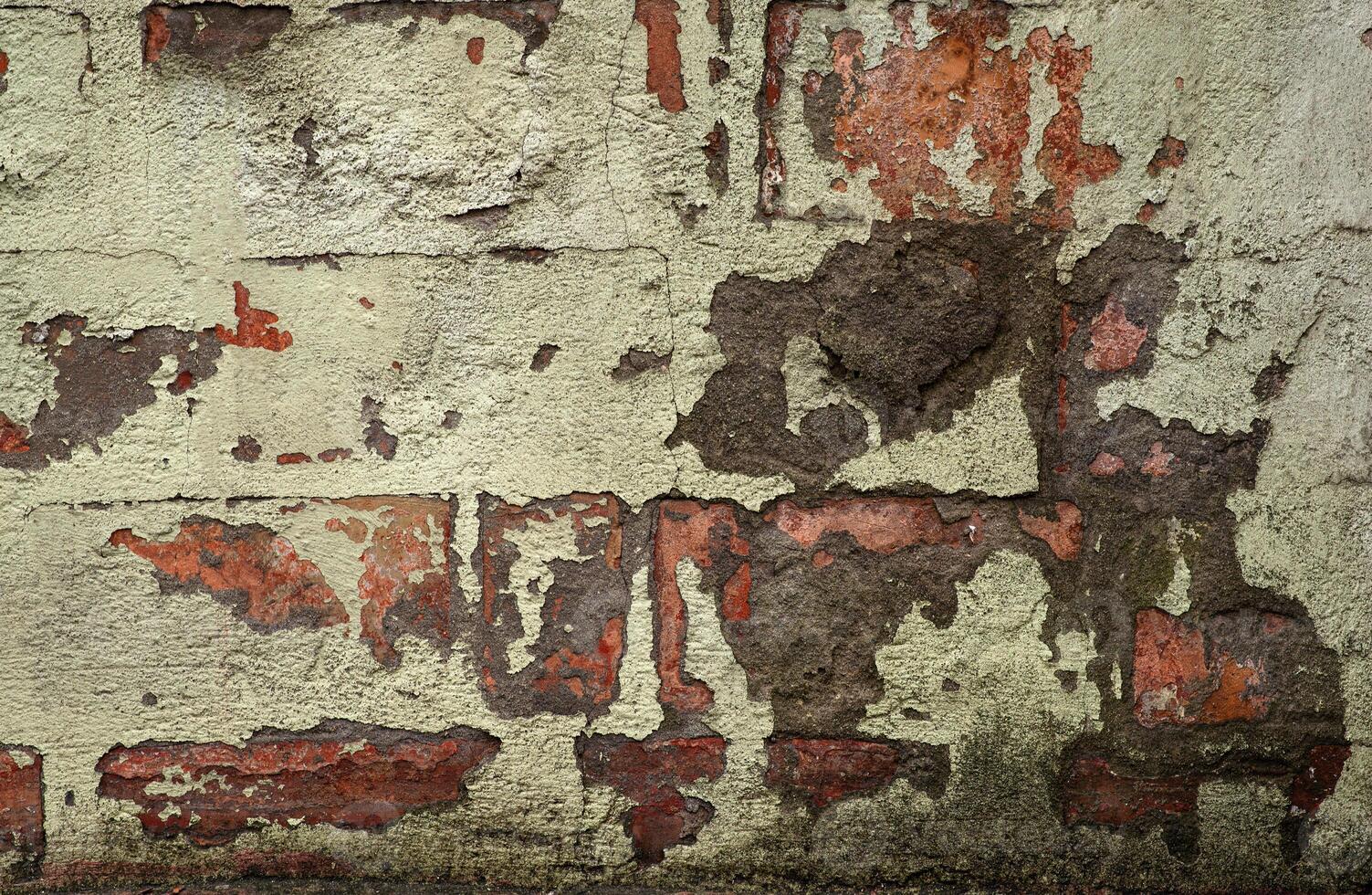 old brick wall green and orange color, horizontal background. abstract close-up old brick wall background photo