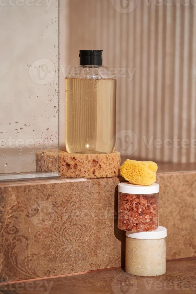 Composition of body gel, scrubbed and natural sponges. photo