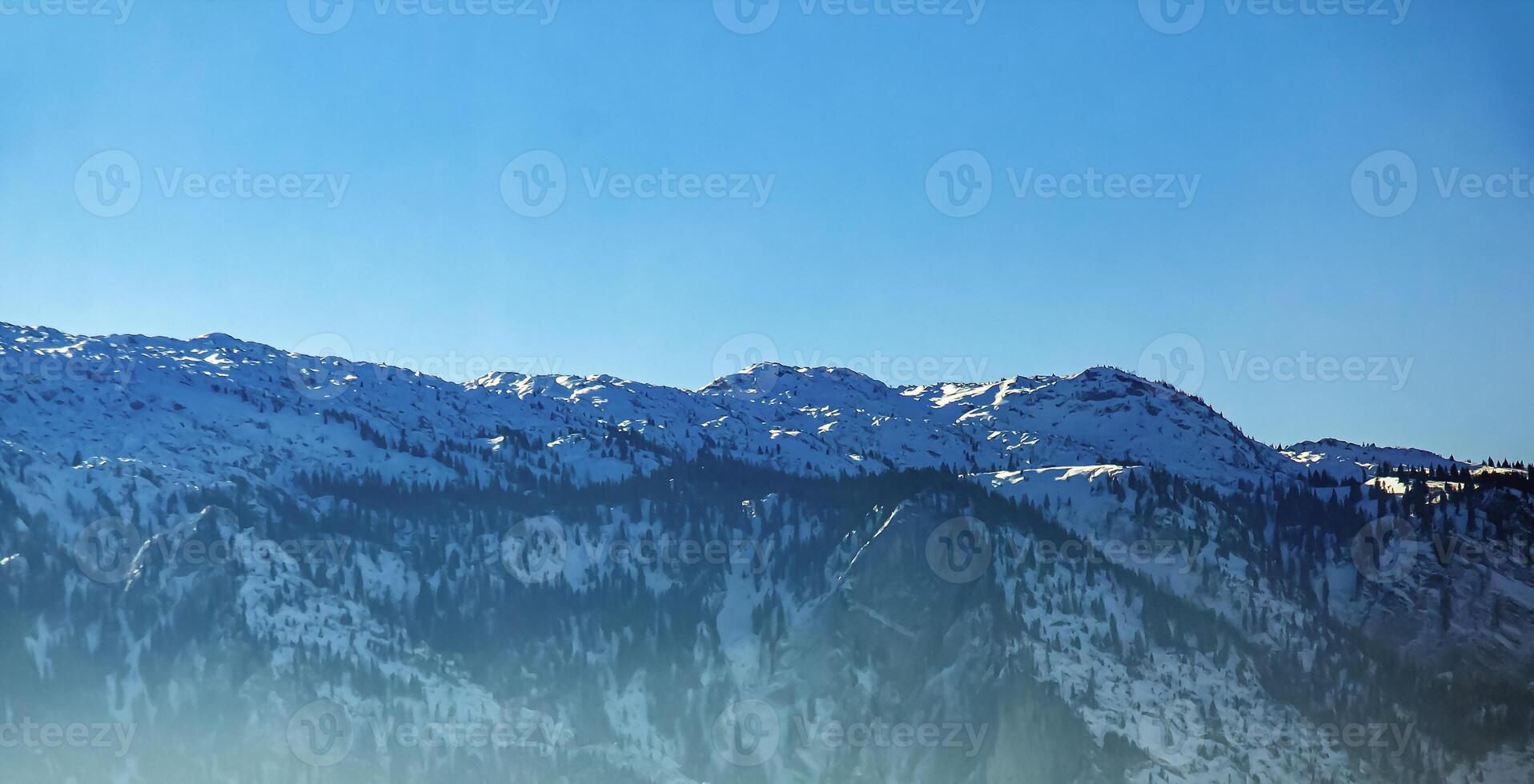 Winter in the Alps. Beautiful view of the mountain ranges in Salzburg in Austria. photo