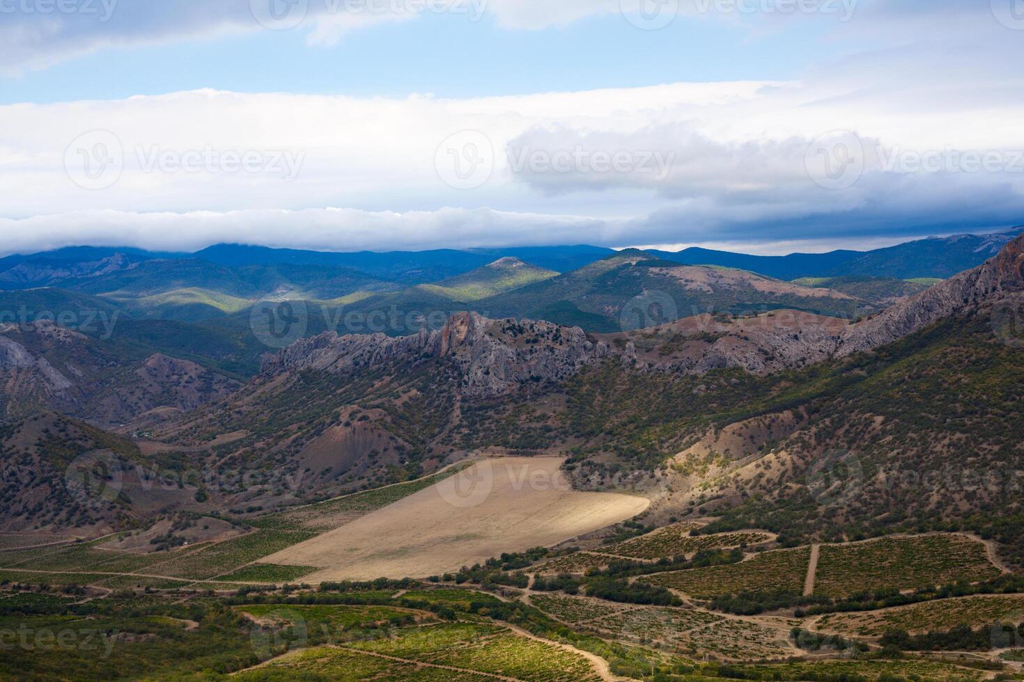 beautiful valley in the mountains with vineyards photo