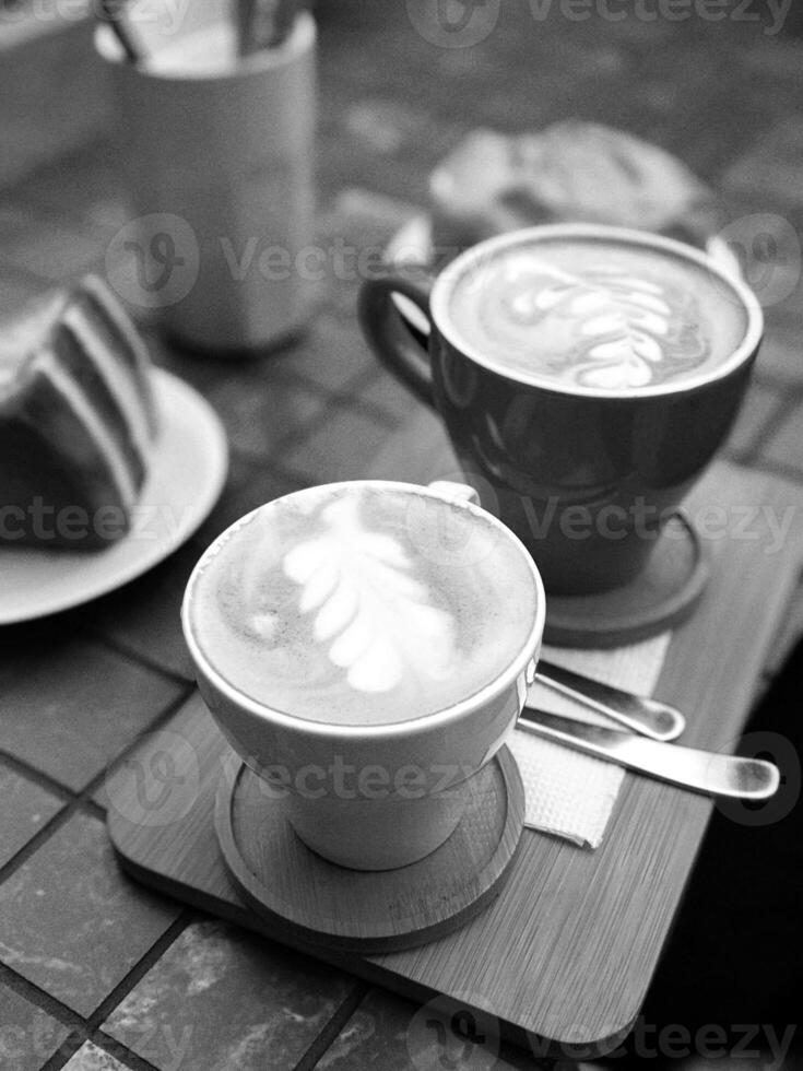 Coffee cup close vew black and white photo background, cup of tea or coffee on the table