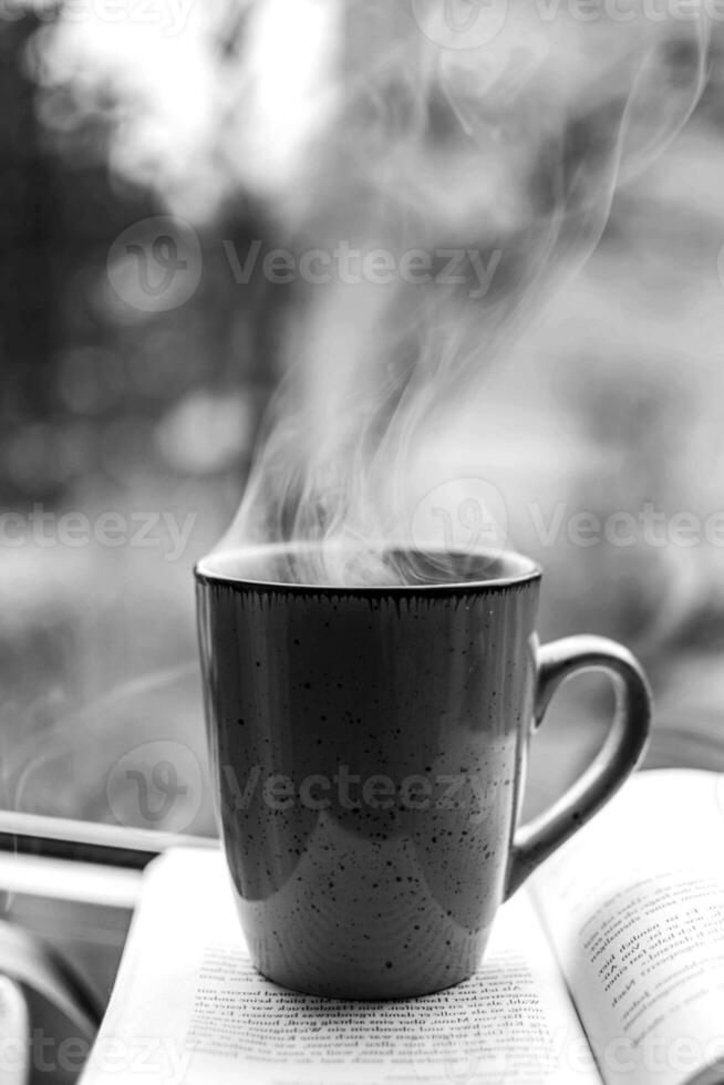 Coffee cup close vew black and white photo background, cup of tea or coffee on the table