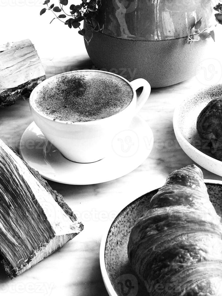 Coffee cup close vew black and white photo background, cup of tea or coffee on the table