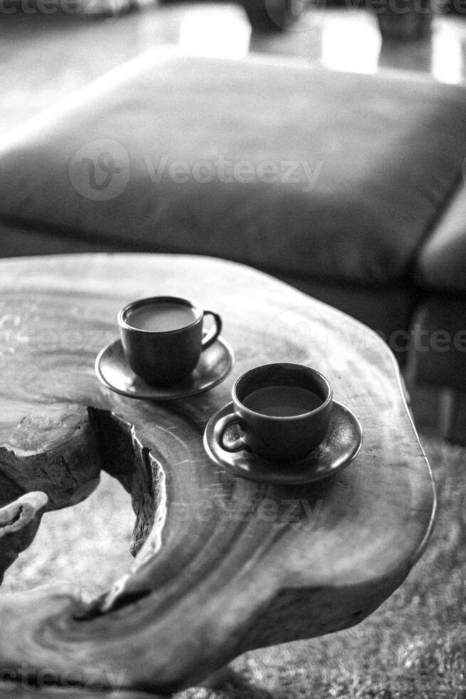 Coffee cup close vew black and white photo background, cup of tea or coffee on the table