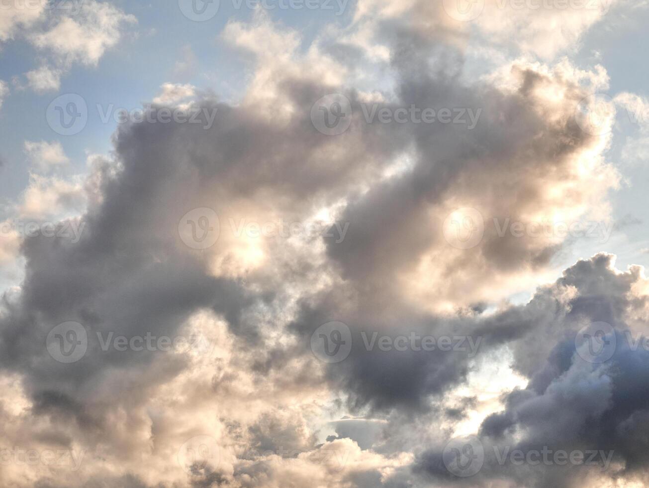 White fluffy clouds in the deep blue sky. Heaven background photo