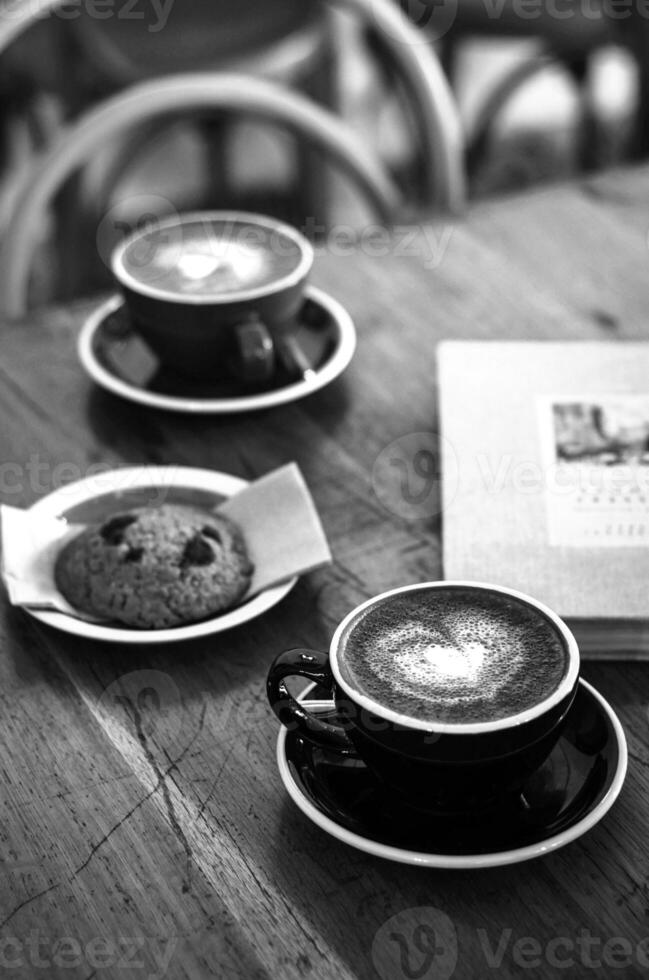 Coffee cup close vew black and white photo background, cup of tea or coffee on the table