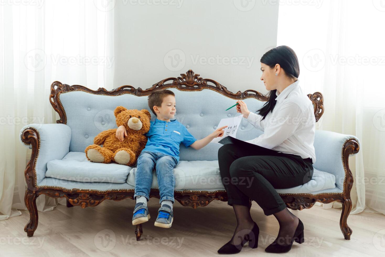 The concept of child psychology. A boy at the psychologist photo