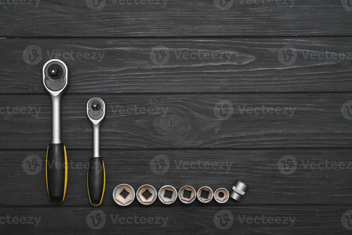 Set of hand tools . Equipment on wooden background. photo