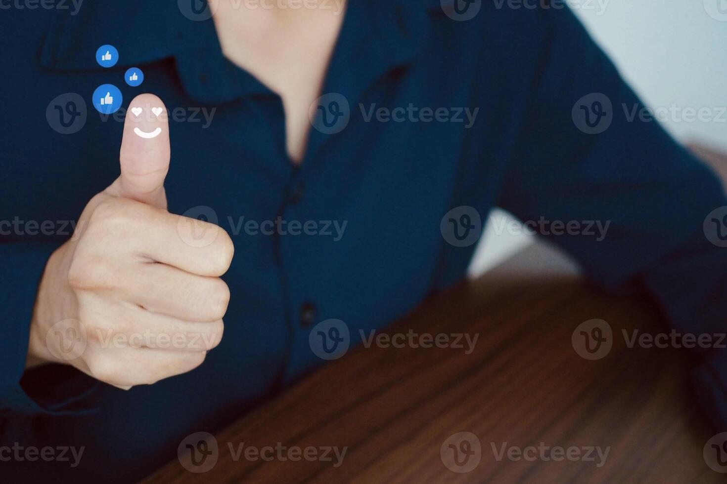 Business woman giving thumbs up There is a like symbol. Social media and digital online concept social distancing work from home. photo