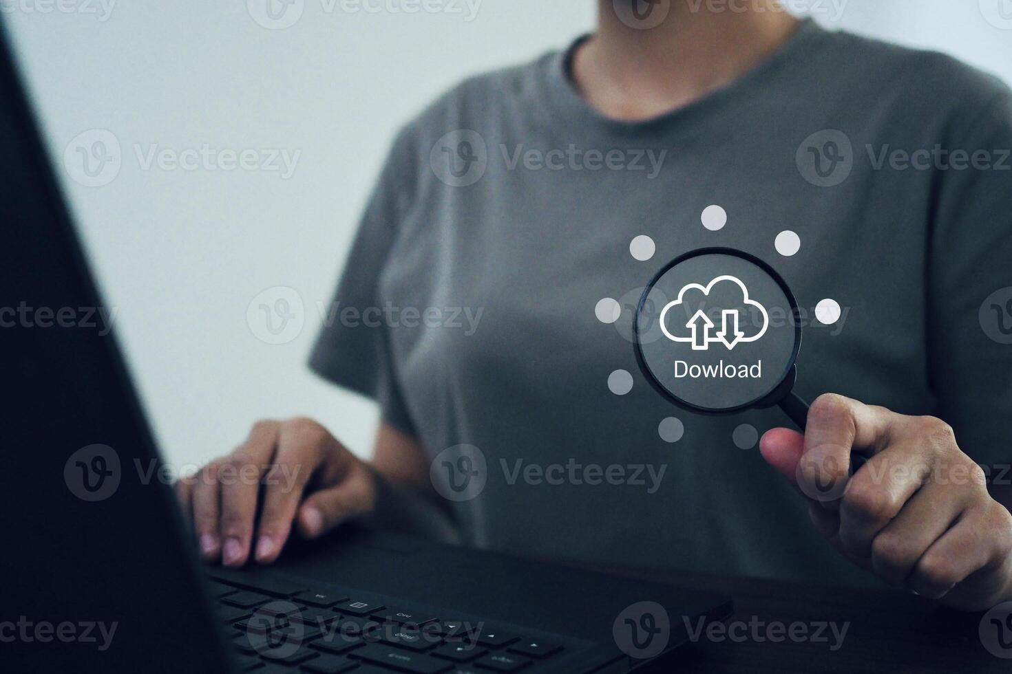 Businessman holds virtual cloud magnifying glass with copy space to transfer data and upload. online data download concept. photo