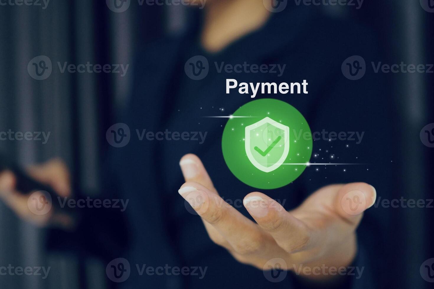 Businessman holds payment icon using NFC payment, cashless technology, contactless and money transfer concept. photo