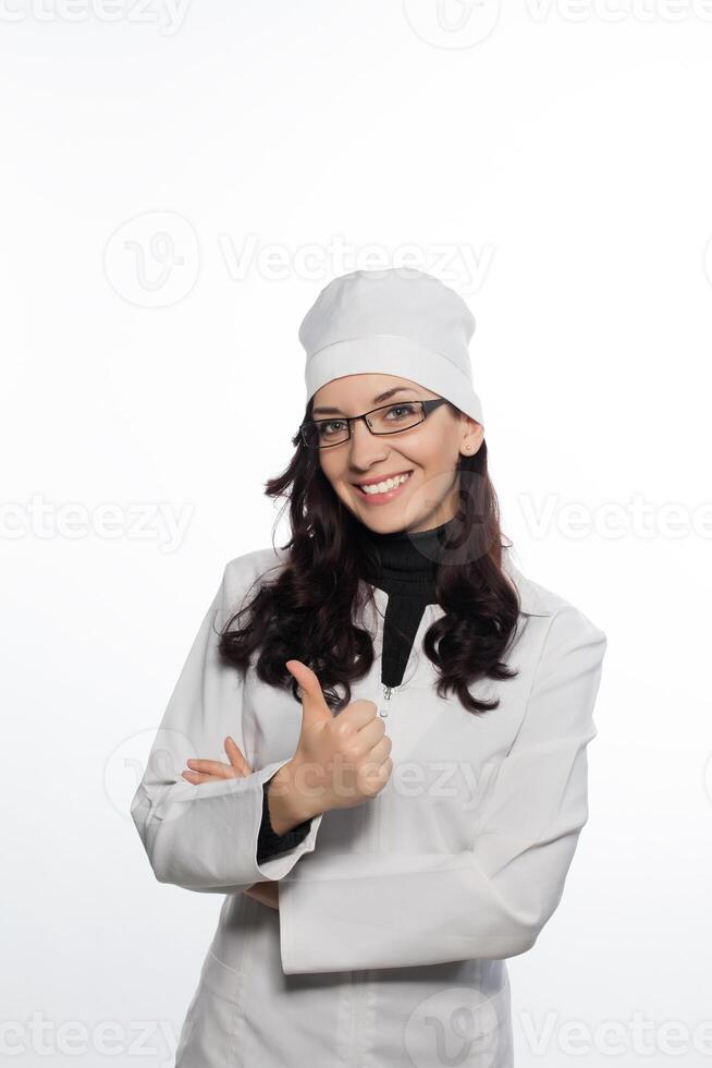 a woman in a white coat and glasses photo