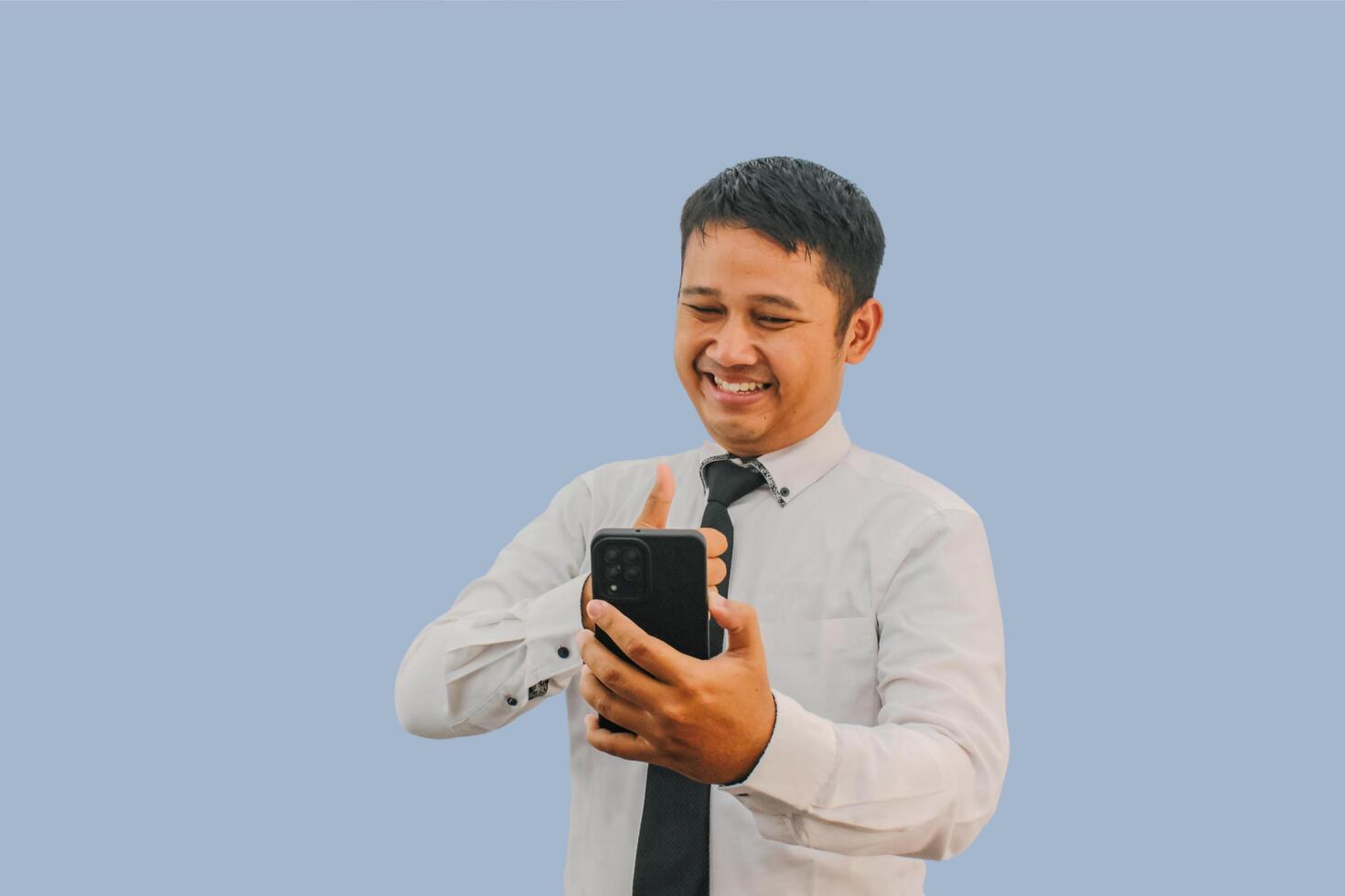Adult man asian with smilling happy expression  and give thumb to mobile phone photo