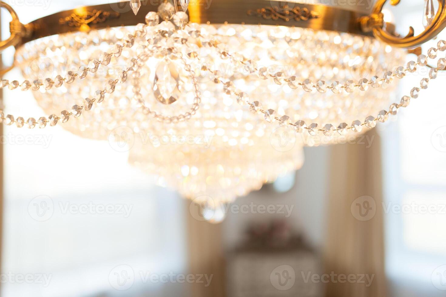 Elegant crystal strass chandelier with lamps photo