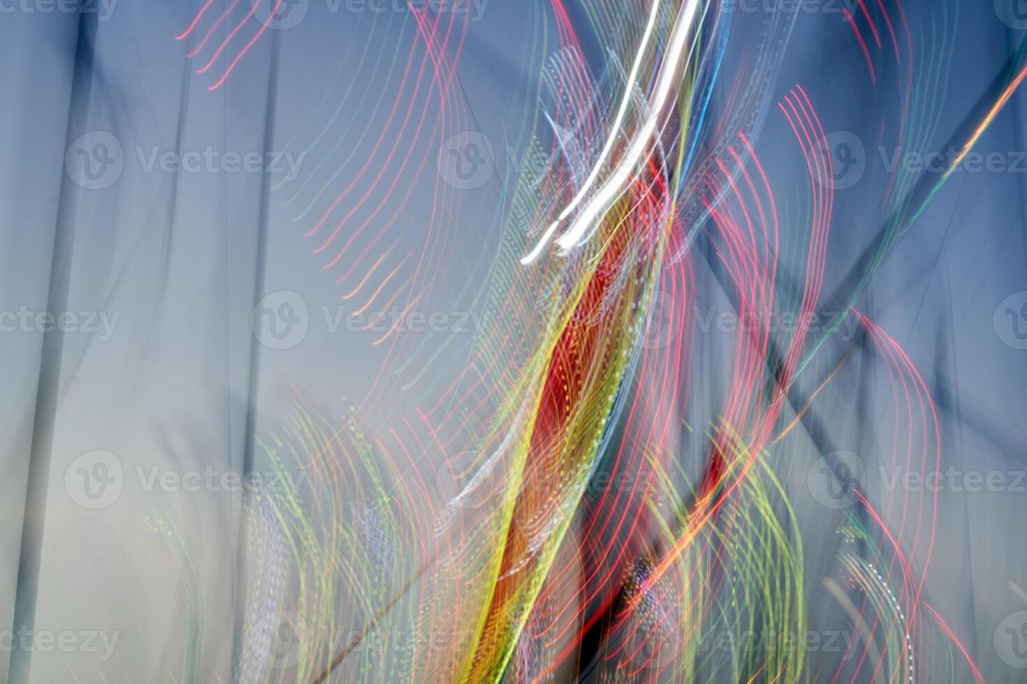 Amusement park blurred effect. Abstract illuminated background photo