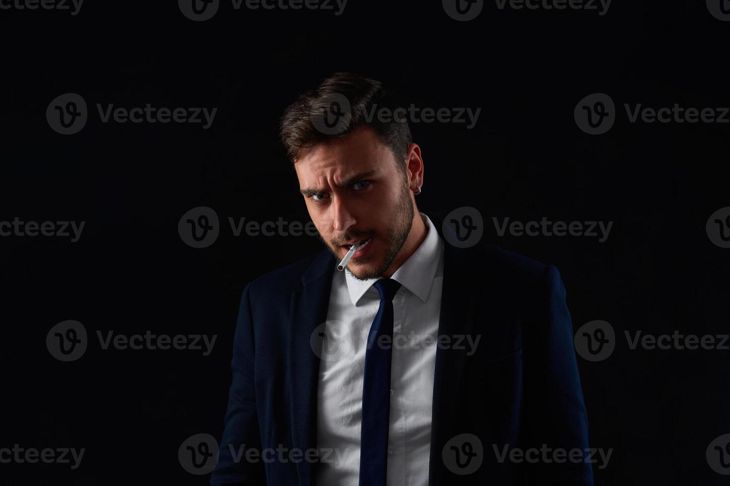 Close up portrait young man businessman. Caucasian guy business suit studio gray background. photo