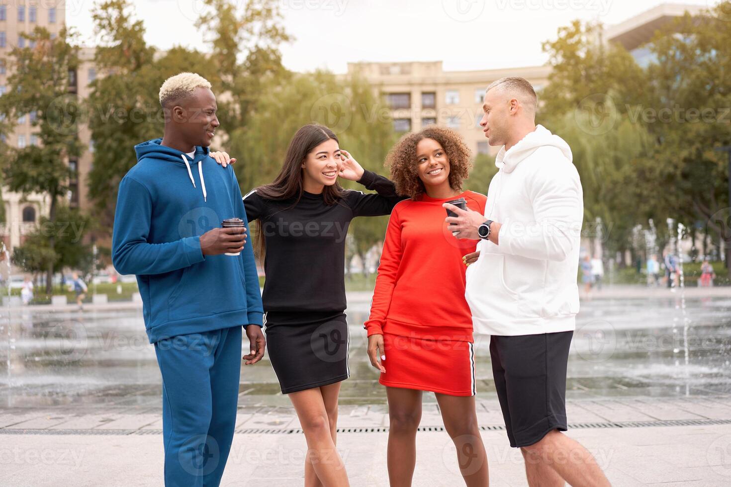 Multi-ethnic group people teenage friends. African-american, asian, caucasian student spending time together Multiracial friendship photo