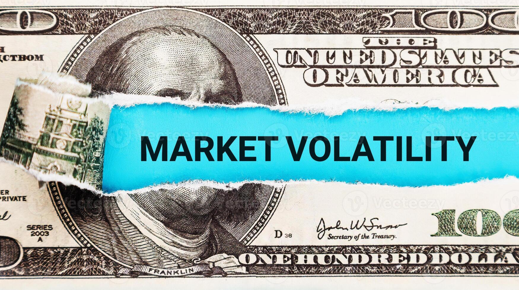 Market Volatility. The word Market Volatility in the background of the US dollar. Financial Market Volatility Concept. Shaky Stock Market Graph, Roller Coaster Ride of Investments and Trading photo