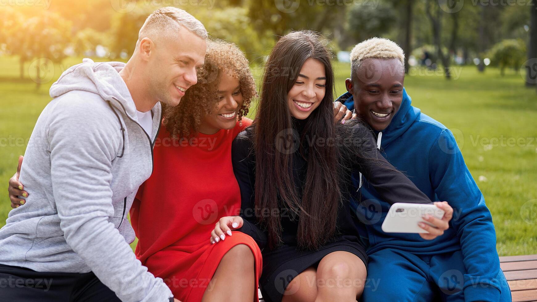 Multi ethnic friends outdoor. Diverse group people Afro american asian spending time together photo