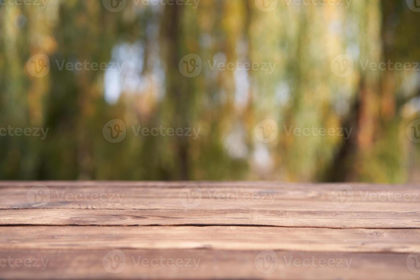 Empty wooden table nature bokeh background with a country outdoor theme,Template mock up for display of product photo
