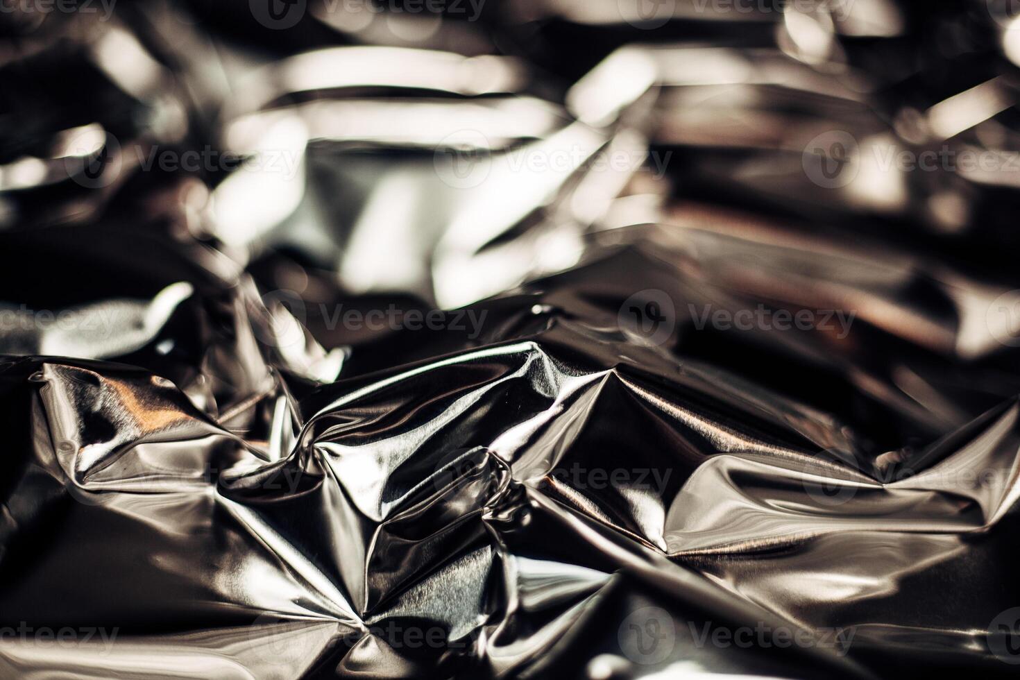 Full frame take of a sheeT of crumpled silver aluminum foil photo