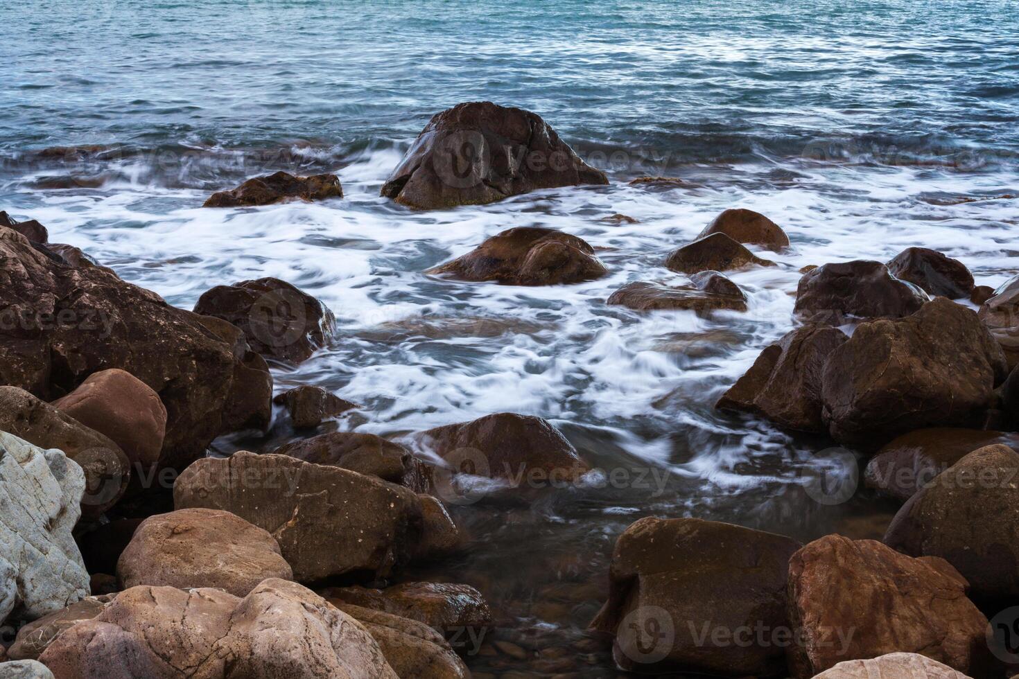 stone in the sea or ocean photo