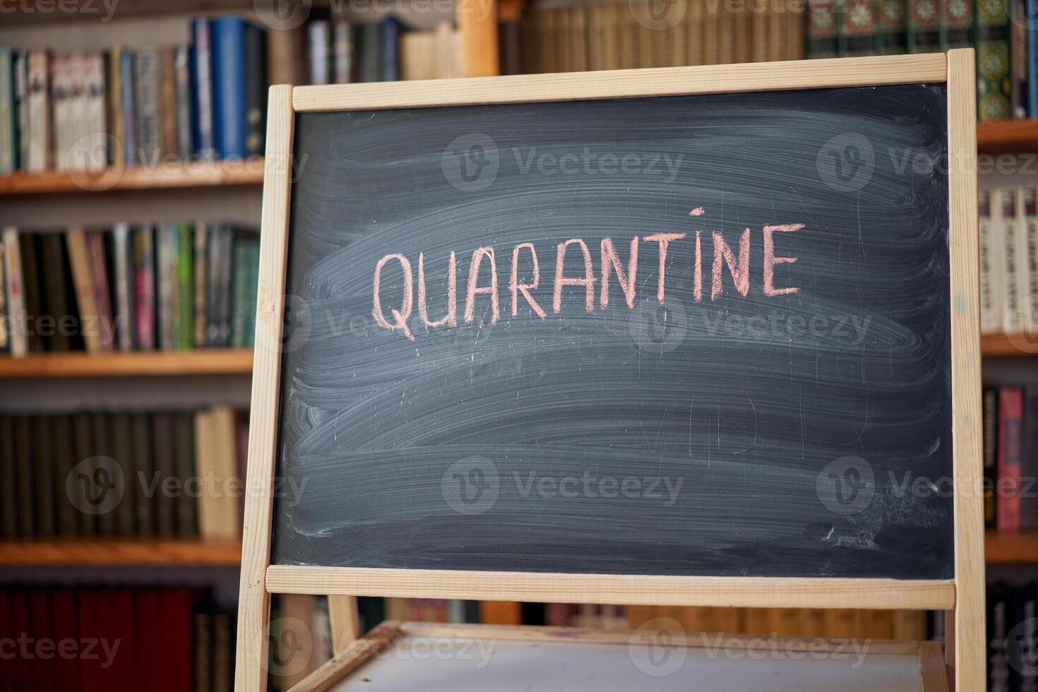 Outbreak Warning. written white chalk on blackboard in connection with epidemic of coronavirus worldwide. photo