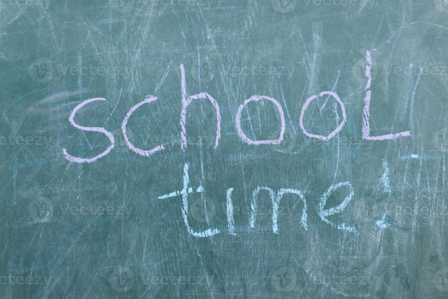 Chalkboard with wooden frame and the text school time photo
