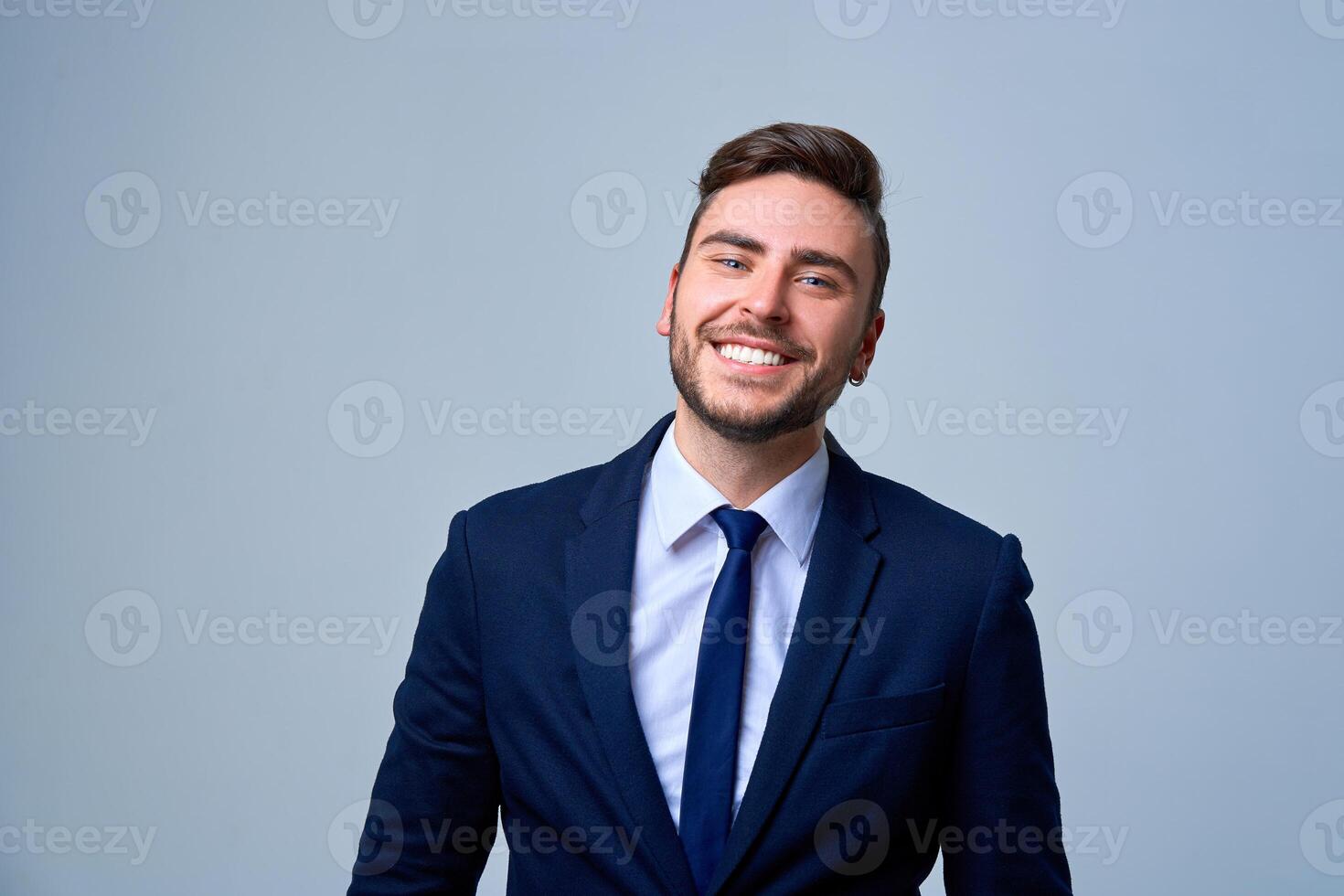 Close up portrait young man businessman. Caucasian guy business suit studio gray background. photo