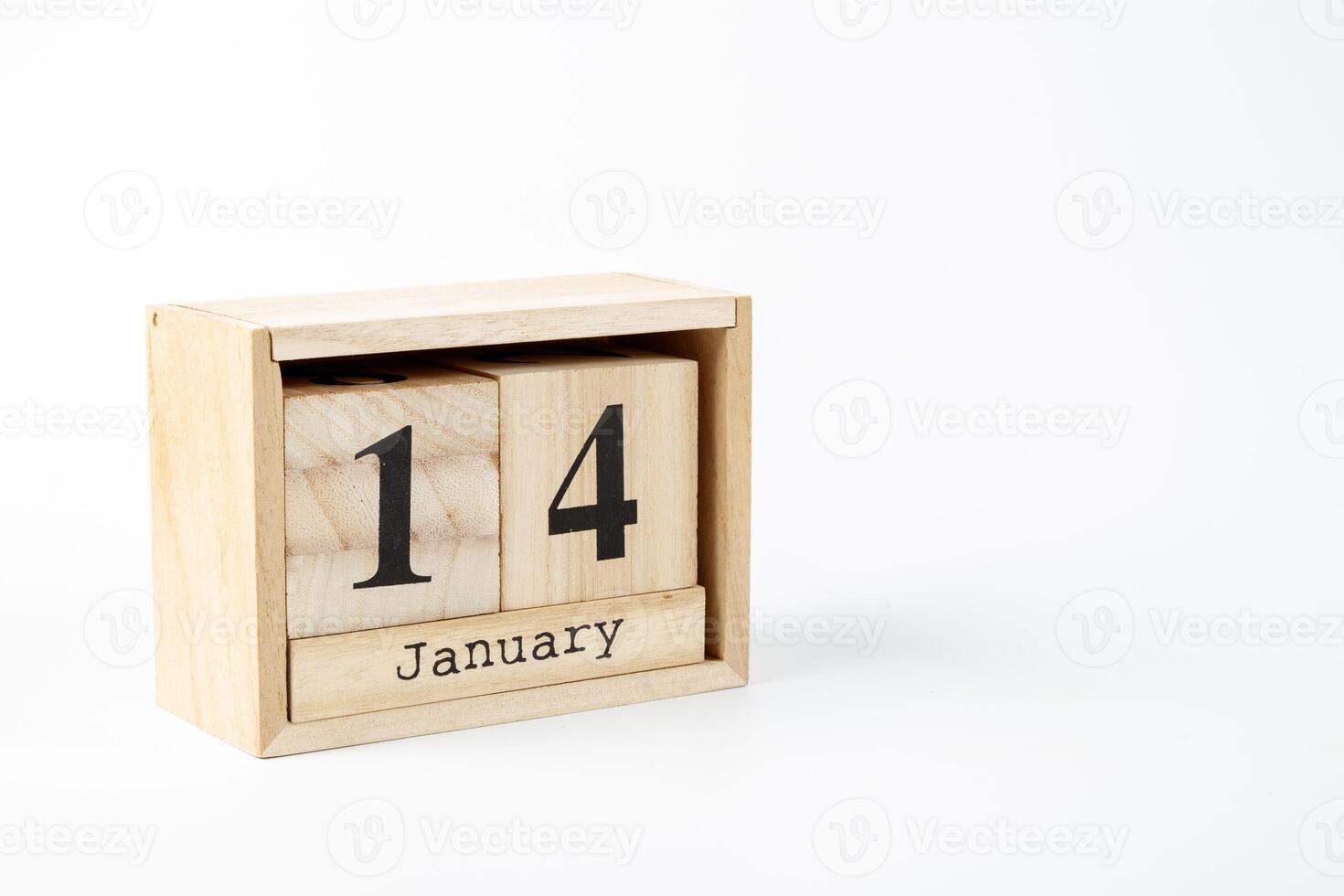 Wooden calendar January 14 on a white background photo