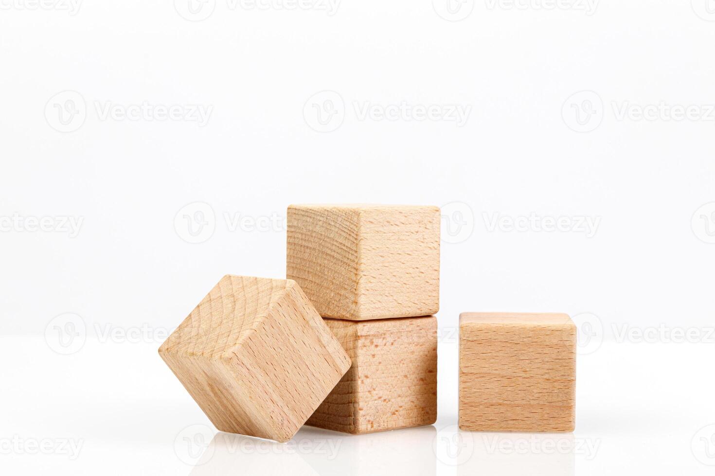 Wooden cubes on a white background photo