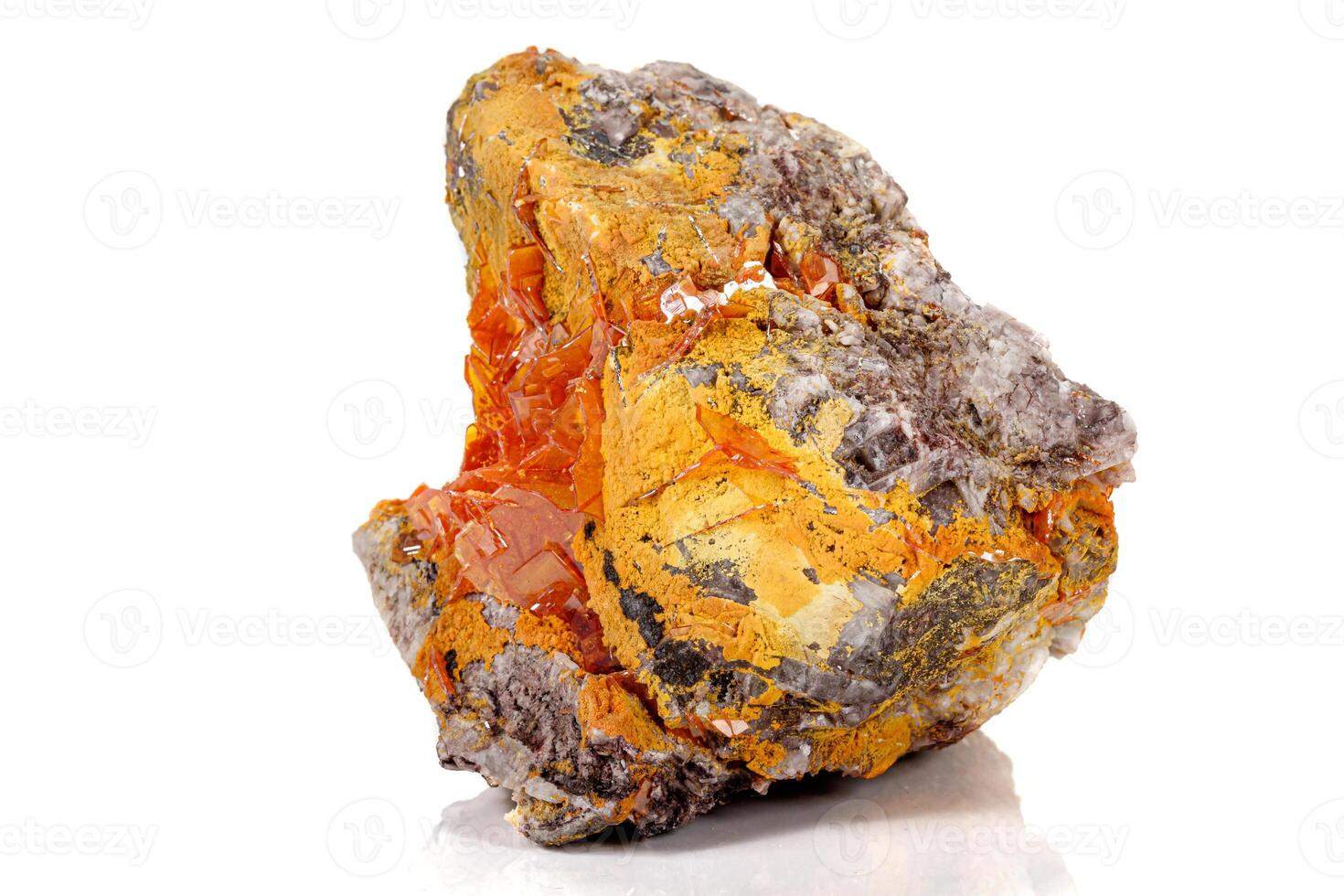 Macro stone mineral Wulfenite on a white background photo