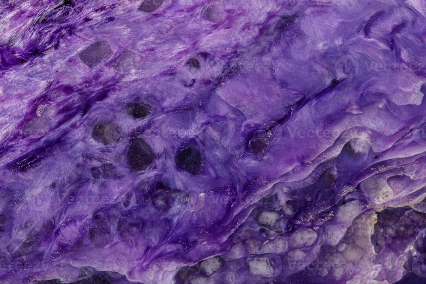 macro mineral stone Charoite on a white background photo
