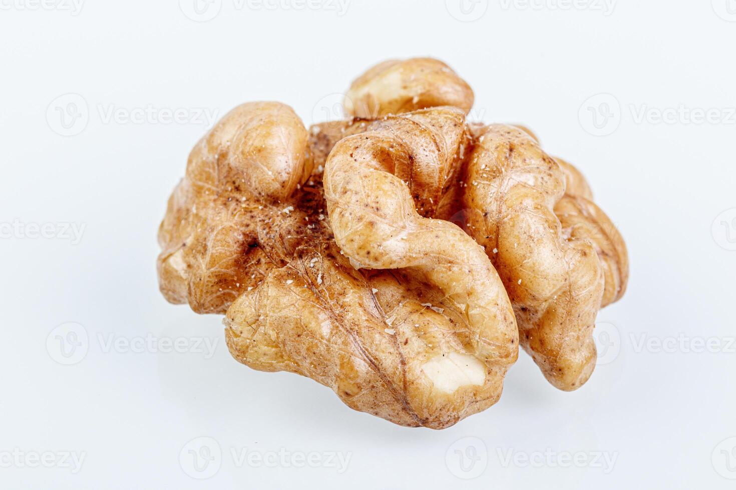 macro juglandaceae nuts, walnut on a white background photo