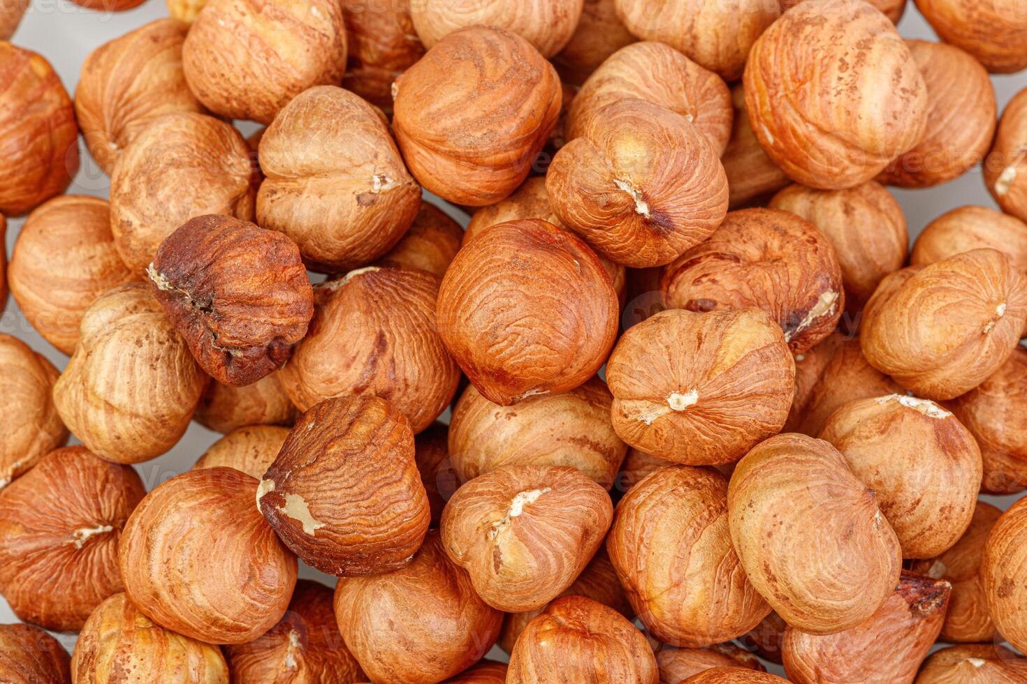 macro hazelnuts nuts on a white background photo