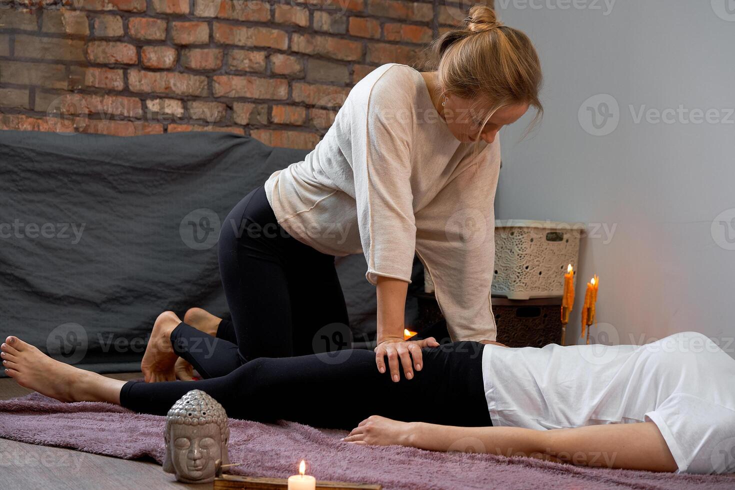 Relax and enjoy in spa salon, getting thai massage by professional masseur. photo