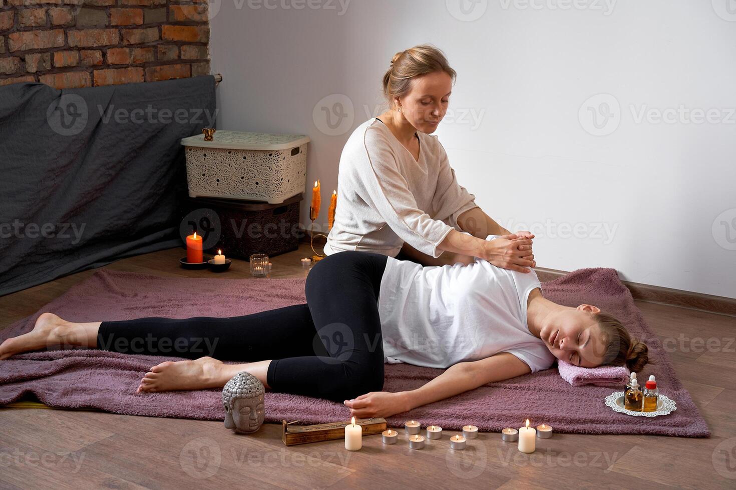 Relax and enjoy in spa salon, getting thai massage by professional masseur. photo