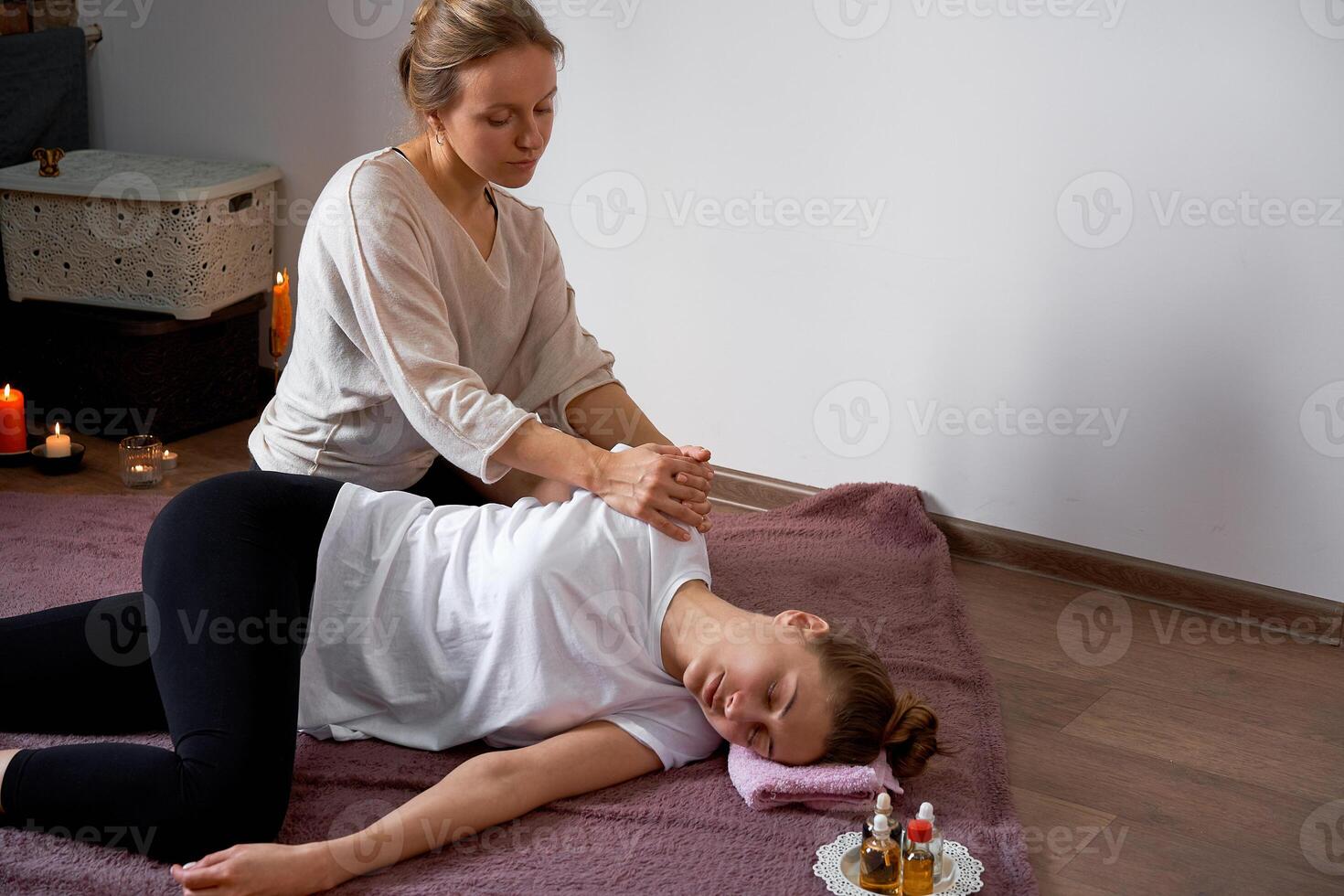 Relax and enjoy in spa salon, getting thai massage by professional masseur. photo
