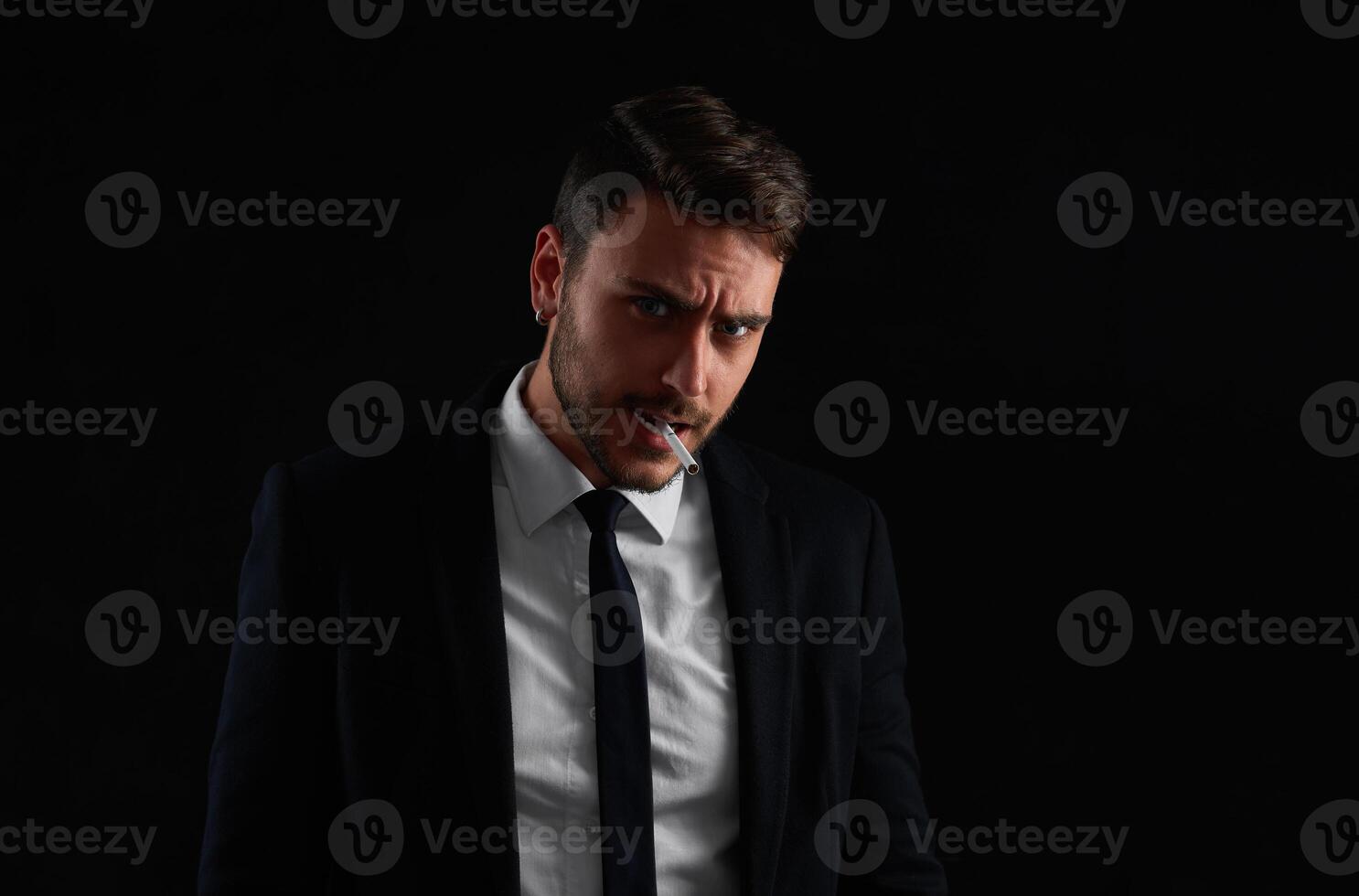 Close up portrait young man businessman. Caucasian guy business suit studio gray background. photo