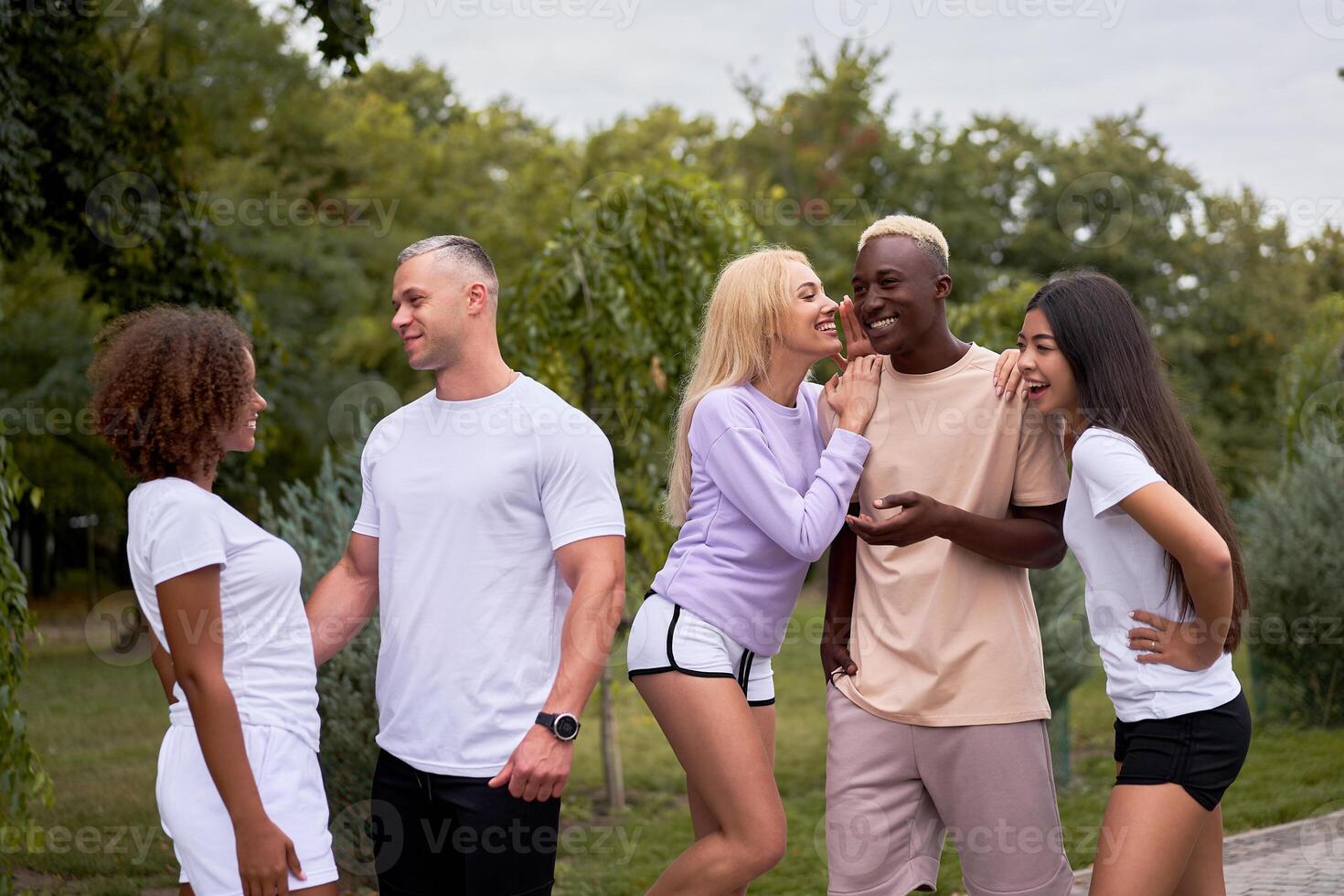 Multi-ethnic group people teenage friends. African-american, asian, caucasian student spending time together Multiracial friendship photo