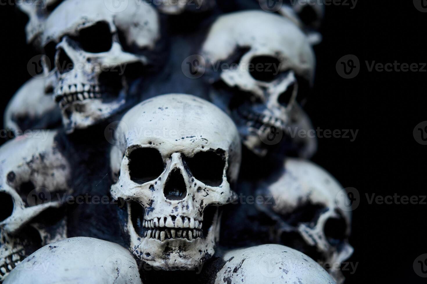 Skull Halloween background Many people skulls stand on top of each other. photo