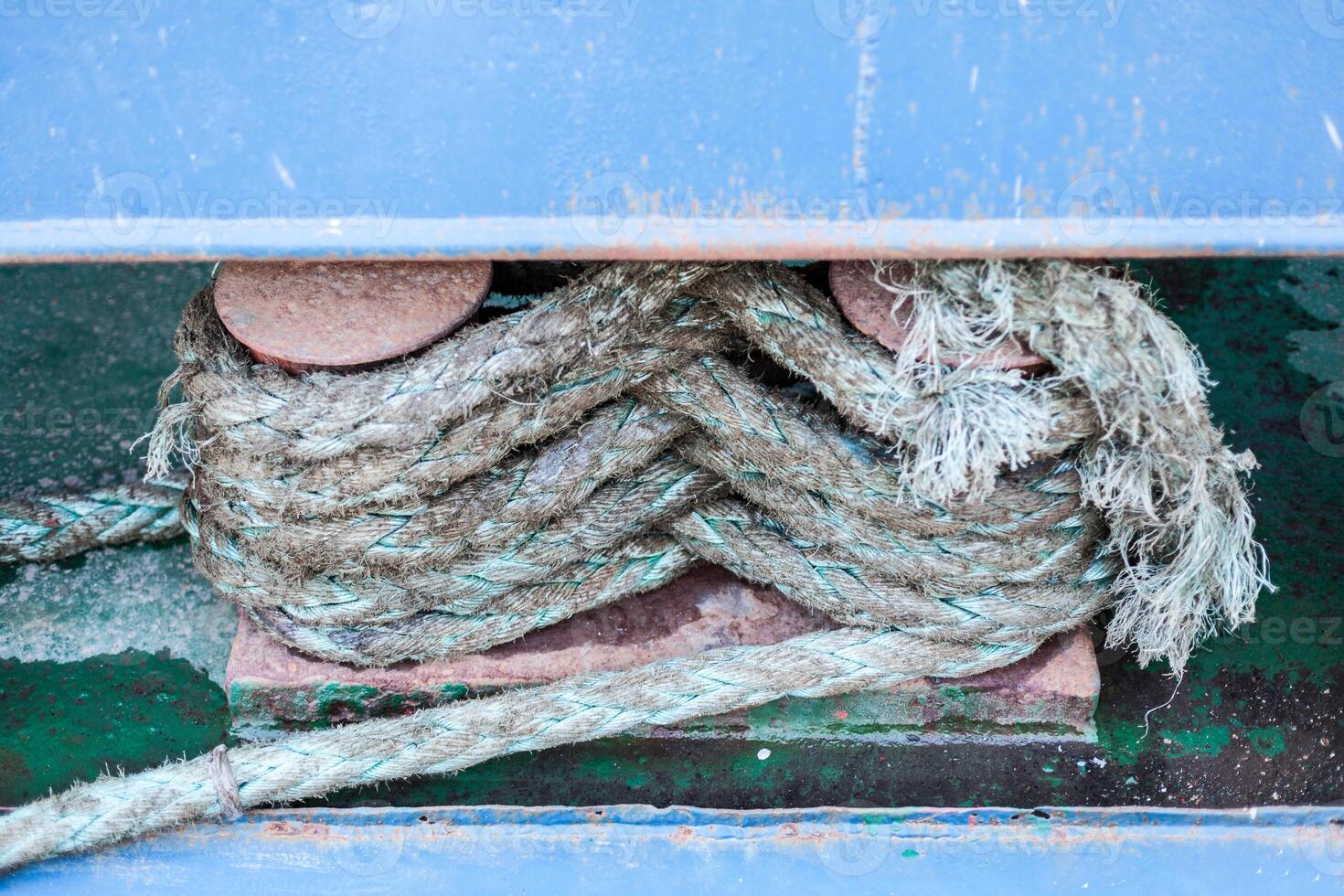 Close Up of Boat Rope Tied on Figure Eight Cleat Hitch photo